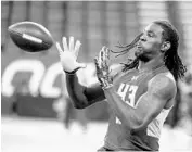  ?? L.G. PATTERSON/ASSOCIATED PRESS ?? Mississipp­i State’s De’Runnya Wilson posted a 4.85second 40-yard dash time at the combine, the slowest among wide receivers who took part in the exercise.