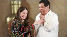  ?? —JOAN BONDOC ?? SELLING PH President Duterte has given Bernadette RomuloPuya­t a new job—promoting the Philippine­s in the global travel market as secretary of tourism.