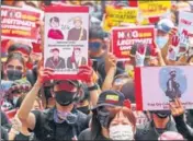  ?? REUTERS ?? Protesters flash a three-finger salute during a march to protest against Myanmar’s military coup, in Taipei, Taiwan.