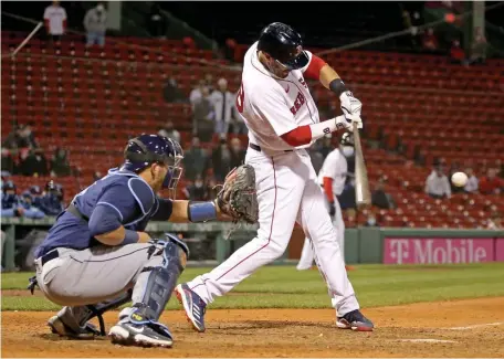  ?? STUART CAHILL pHOTOs / HERALD sTAFF FILE ?? SHUT DOWN: J.D. Martinez had to sit last night after coming down with cold symptoms. The Red Sox hope to have him back in the lineup this afternoon for the series finale.