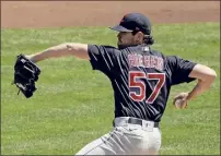  ?? Dylan Buell / Getty Images ?? Shane Bieber of the Indians pitches in the first inning against the Cincinnati Reds at Great American Ball Park in Cincinnati on Sunday.