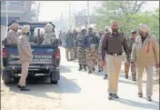  ?? SANJEEV KUMAR/HT ?? Security personnel on vigil after protests following the suicide at Bhai Bakhtaur village in Bathinda on Thursday.