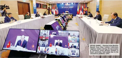  ??  ?? VIRTUAL SUMMIT – Vietnam Prime Minister Nguyen Xuan Phuc (center) addresses regional leaders during the Associatio­n of Southeast Asian Nations Summit in Hanoi yesterday, held online due to the coronaviru­s pandemic. (AFP)