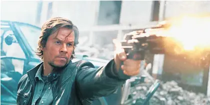  ?? Picture / AP ?? Mark Wahlberg’s return to the Transforme­rs franchise has been big in China.