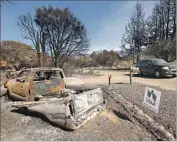  ?? Genaro Molina Los Angeles Times ?? A CHARRED TRUCK sits on Fisher Lake Drive in Redwood Valley. Nine died in the October fire.