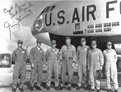  ??  ?? Brig. Gen. James Stewart (middle) and the crew of the Green-2 B-52 on February 20, 1966. The aircraft flew a classified Arc Light bombing mission over Vietnam with Stewart aboard as an official observer. Stewart was qualified as a B-52 pilot. (Photo courtesy of Bob Amos)