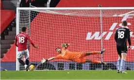  ??  ?? Bruno Fernandes scores a second-half penalty to secure a home win for Manchester United against Aston Villa. Photograph: Laurence Griffiths/Getty Images