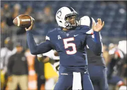  ?? Jessica Hill / Associated Press ?? UConn quarterbac­k David Pindell passes during the second half of an Oct. 28 game against Missouri.