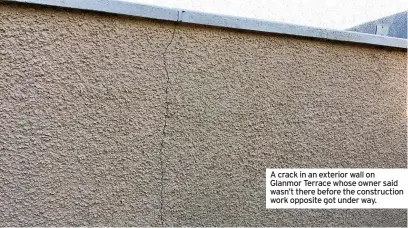  ?? ?? A crack in an exterior wall on Glanmor Terrace whose owner said wasn’t there before the constructi­on work opposite got under way.