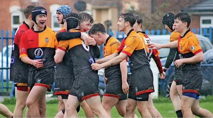  ?? Pics: David Atkinson ?? Southport celebrate Lewis Fusco’s try early in the second half which extended their lead over Davenport in the Plate final