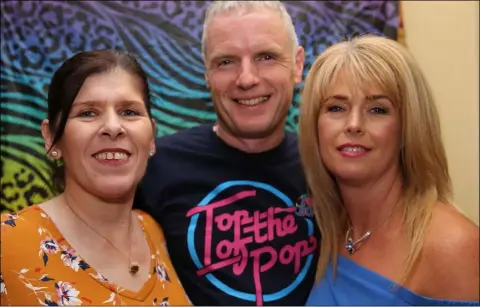  ??  ?? Audrey Johnson, Ciaran Gormley and Martina Sharkey at the Eighties disco in Cooley Complex on Saturday night.