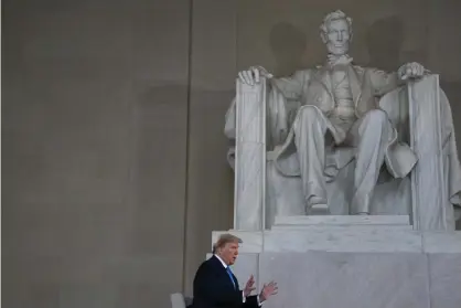  ??  ?? ‘One of the most obvious problems with parking yourself in a chair next to a colossal statue of Abraham Lincoln is that you look so very small.’ Photograph: Evan Vucci/AP