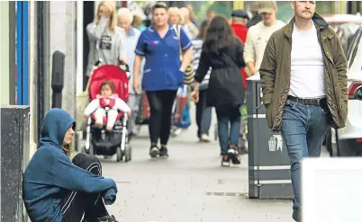  ?? Pictures: Dougie Nicolson. ?? Some people don’t see people begging as a problem.