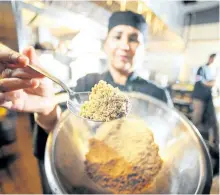  ?? BILL KEAY/VANCOUVER SUN ?? Amarjeet Gill shows cricket dough. It’s made by roasting crickets and grinding them into a flour mixture. The dough will be baked into a spicy paratha, an Indian flatbread.