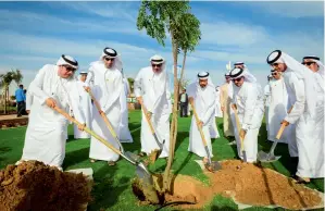  ?? Photo by Neeraj Murali ?? Dr Thani bin Ahmed Al Zeyoudi, Hussain Nasser Lootah and other municipali­ty officials plant a tree during the inaugurati­on of Al Warqa-3 Park in Dubai on Sunday. —