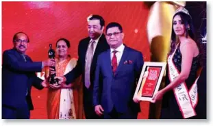  ??  ?? The award was given to Clarks Shiraz, Agra and, received by Geetha Subramania­n, General Manager Marketing &amp; Sales, Rupak Gupta, Joint Managing Director (U.P. Hotels) and Debasish Bhowmik, Senior Vice President