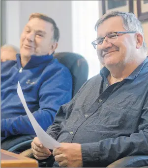  ?? MITCH MACDONALD/THE GUARDIAN ?? Coun. Wayne Spin, right, and Coun. Jim Bagnall listen to a presentati­on during a recent Montague council meeting. Spin challenged his fellow councillor­s to take part in the Clean Canada Together initiative this Saturday, which is being followed by a...