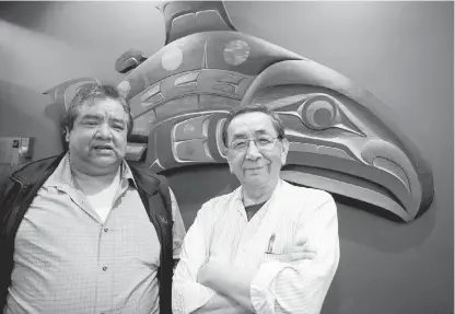  ??  ?? Raymond Jones Peter Jr., left, from Cowichan Tribes and Henry Chipps, from Beecher Bay First Nation, work as role models in schools in Sooke School District teaching Indigenous and non-Indigenous students about history, culture, and life.