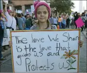  ?? RALPH BARRERA/AMERICAN-STATESMAN ?? Luna Hood, 9, from Terlingua, joined in the Women’s March along Congress Avenue on Jan. 21, 2017.