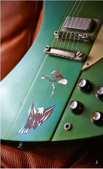  ??  ?? 3 3. Johnny’s Firebird V features an iridescent inlay of an eagle and cloud with an emerging lightning bolt on the front of the body