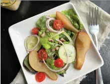  ?? ?? This elegant salad from Alexander Smalls is built around the childhood flavors of pears, field greens and black-eyed peas. It's tossed in a sweet, savory citrus vinaigrett­e.