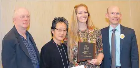  ??  ?? Jessica Sanders (third from left) has been named New Mexico Science Teacher of the Year. Helping her to celebrate are Donivan Porterfiel­d, left, and Ning Xu, second from left, of the Central New Mexico Local Section of the American Chemical Society,...