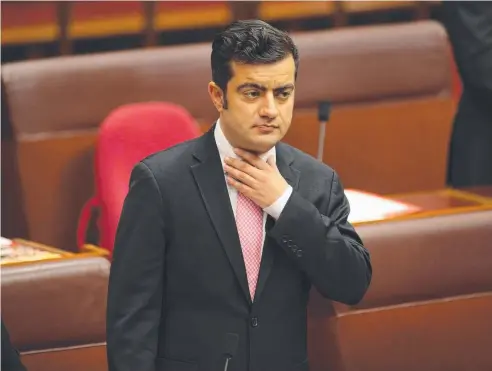  ?? Picture: GARY RAMAGE ?? NO WAY OUT: Labor’s Sam Dastyari feels the heat in the Senate chamber.