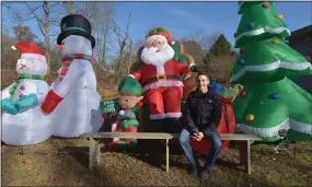  ?? PETE BANNAN - MEDIANEWS GROUP ?? Gavin Snyder in front of part of his Christmas Holiday display.