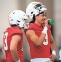  ?? BRIANNA PACIORKA/NEWS SENTINEL ?? Tennessee quarterbac­k Nico Iamaleava (8) takes a break during UT’s first spring practice March 18.