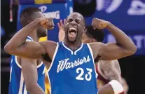  ?? MARCIO JOSE SANCHEZ/THE ASSOCIATED PRESS ?? Golden State’s Draymond Green reacts after scoring against the Cavaliers on Friday. Green had 22 points and 15 rebounds as the Warriors beat Cleveland 89-83.