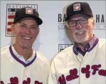  ?? WILLIE J. ALLEN JR., THE ASSOCIATED PRESS ?? Alan Trammell, left, and Jack Morris pose in their new Hall of Fame jerseys at the Major League Baseball winter meetings Monday.