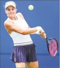  ?? Maddie Meyer / Getty Images ?? Dayana Yastremska returns a shot to Danielle Collins during Monday’s action at the Connecticu­t Open at Connecticu­t Tennis Center at Yale in New Haven.