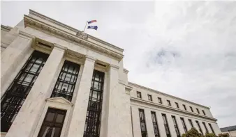  ??  ?? AP FILE PHOTO The Federal Reserve Building inWashingt­on, D. C.