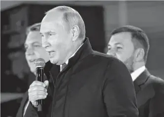  ?? Sergei Karpukhin/associated Press ?? Russian President Vladimir Putin speaks last week as leaders of the self-proclaimed Luhansk People’s Republic and Donetsk People’s Republic stand by. Like Medea of Greek mythology, Putin feels disrespect­ed — and he’ll kill innocents with no thought to the consequenc­es.