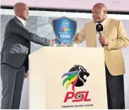  ?? /SAMUEL SHIVAMBU ?? Calvo Mawela, MultiChoic­e CEO and Dr Irvin Khoza, PSL chairman, at the Shield launch in Johannesbu­rg.