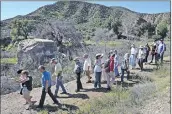  ?? Dan Watson/The Signal ?? A group tours the St. Francis Dam structure in this Signal file photo.