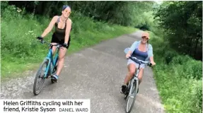  ?? DANIEL WARD ?? Helen Griffiths cycling with her friend, Kristie Syson