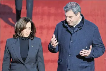  ?? Reuters ?? Closely watched: US vice-president Kamala Harris is welcomed by Bavarian premier Markus Söder as she arrives to attend the internatio­nal Munich Security Conference, at Munich Franz Josef Strauss Airport, Germany, on Thursday. /