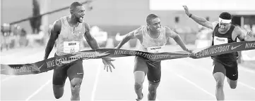  ??  ?? Justin Gatlin (left) celebrates as he win the Men’s 100 Meter Final during Day 2 of the USA Track & Field Championsh­ips at Hornet Satdium in Sacramento, California in this June 23 file photo. — AFP photo