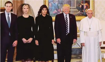  ?? REUTERS PIC ?? Pope Francis with United States President Donald Trump and his wife, Melania (centre), son-in-law Jared Kushner (left) and daughter Ivanka (second from left) during a private audience at the Vatican yesterday.