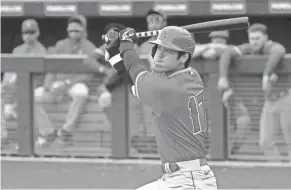  ?? JOE CAMPOREALE/USA TODAY SPORTS ?? Angels designated hitter Shohei Ohtani bats against the Mariners during a spring training game March 10 in Peoria, Ariz.