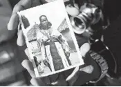  ??  ?? “I’m captivated by theway she stands there andwears her dress as if itwere armor,” Maaza Mengiste said of this undated photograph in her archive.