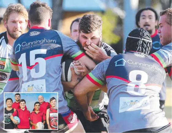  ?? Picture: GLENN HAMPSON, RICHARD GOSLING ?? Coolangatt­a Tweed defenders bring down a Alleygator­s rival, helping set the scene for the club’s future for youngsters (inset, from left) Reuben Tamaraki, 11, Will Sullivan, 11, Leeton Jacky, 12, and Robert Lee, 12. The kids are pictured with senior captain Mitch Planten and president Stu Donnelly.