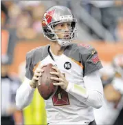  ?? AP FILE ?? QB Mike Glennon, who was 5-13 as a starter in Tampa Bay before losing his job to Jameis Winston, is expected to earn $14 million to $15 million per season in Chicago.