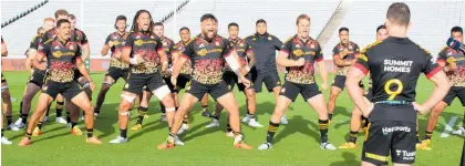  ?? Photo / Photosport ?? Gallagher Chiefs team perform a haka for co-captain Brad Weber after his 100th Super Rugby game.