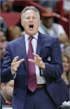  ?? THE ASSOCIATED PRESS FILE ?? 76ers head coach Brett Brown is used to hearing criticism. But the opinion of one man — his legendary coaching father, Bob Brown — carries more weight than any other.