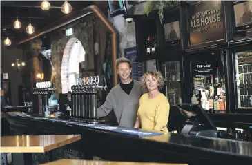  ?? JOHN BISSET/THE TIMARU HERALD ?? Speight’s Ale House owner Jane Bowen, right, said they were “stoked” and “felt proud” to be named on the list. She is pictured with Mark Bower yesterday.