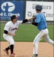  ?? Lowell sun E File ?? dracut’s daniel robichaud is tagged out by tyngsboro’s John shaffer during a 2019 game.