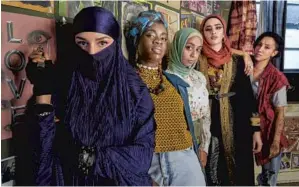  ?? Laura Radford Peacock ?? THE PUNK rockers of Peacock’s “We Are Lady Parts,” above, are British Muslims. They join the cast of Netf lix’s “Never Have I Ever,” far right, in helping to diversify TV.
