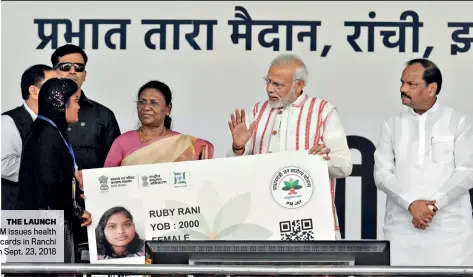  ??  ?? THE LAUNCH The PM issues health cards in Ranchi on Sept. 23, 2018